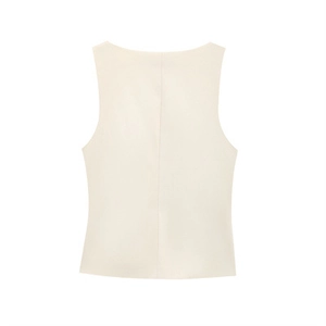 Detail view of the back of a minimalist beige sleeveless top with smooth woven texture