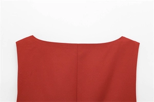 Detailed close-up of dark red sleeveless top neckline with fine fabric texture