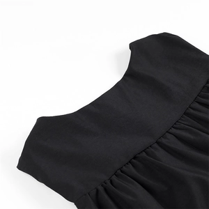 Detail of a black sleeveless top showing the wide crew neck and gathered fabric texture