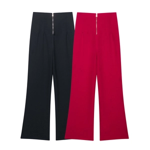 Eleganti pantaloni a vita alta e gamba larga neri e rosso scuro con cerniere dorate