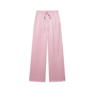 Roze wijde broek met kreukeltextuur en trekkoord in de elastische taille plat neergelegd