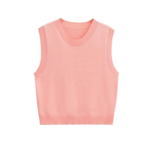 Women's minimalist light pink sleeveless knit vest top with ribbed hem and crew neck