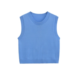 Detail of the sky blue knitted vest showing the fine ribbed neckline and texture