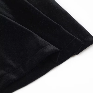 Macro detail of high-quality black velvet fabric with smooth seams and soft sheen