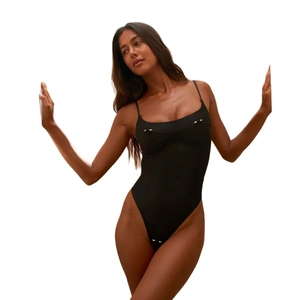Women's black one-piece swimsuit with spaghetti straps and gold studded cone detailing