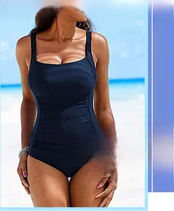 Detail of navy blue one-piece swimsuit with square neckline and ruched waist texture