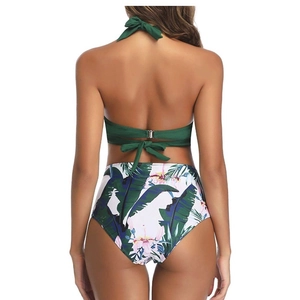 Back view of women's halter bikini with high-waisted tropical leaf and floral print