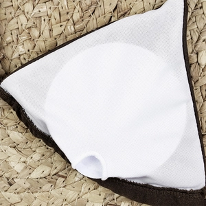 Detail of bikini top interior showing breathable mesh lining and removable padding pocket