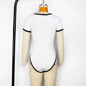 Detail of white ribbed bodysuit with contrast black binding on collar and sleeves