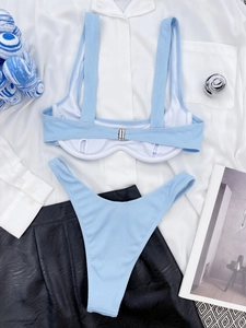 Flat lay of light blue ribbed bikini with metal back clasp and high cut bottoms