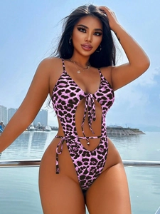 Detail of purple leopard print one-piece swimsuit with cutout and lace-up design