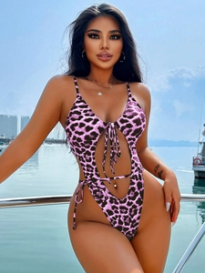 Detailed view of pink and black leopard print monokini with side cut-outs and lace-up ties