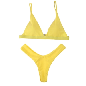 Detail view of bright yellow triangle bikini top with metallic buckle and high cut bottoms
