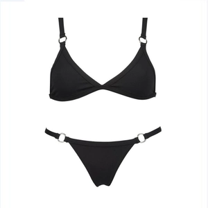 Detail of black bikini set featuring silver metal ring connectors on top and bottom