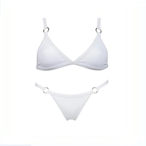 Detail of white bikini set with silver metal rings and textured stretch fabric