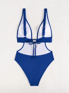 Detail of dark blue ribbed one-piece swimsuit with V-neck and gold ring ornament