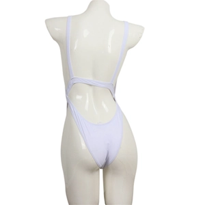 Detailed rear view of white backless one-piece swimsuit with high-cut leg and thin straps