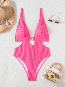 Flat lay of pink one-piece swimsuit with ribbed texture, v-neck and gold ring detail