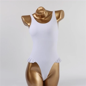 Detail view of a white one-piece swimsuit with ruffled hip accents and a classic U-neck