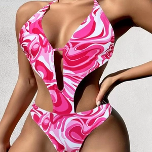 Detail of pink marble swirl print one-piece swimsuit with plunging neckline and cut-outs