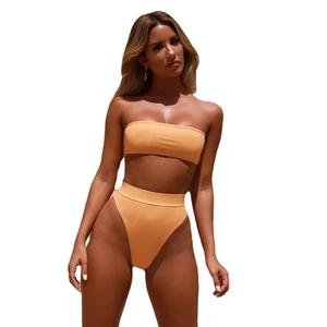 Women's two-piece bandeau bikini set with high-waist bottoms in ribbed orange fabric