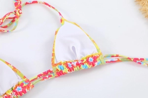 Close-up of floral bikini top showing inner lining and chest pad slot details