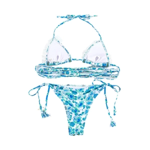 Women's paisley print bikini set featuring halter neck top and side-tie bottoms in teal