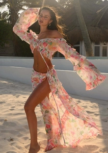 Detail of bohemian floral print two-piece beach set with ruffled chiffon texture