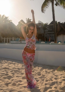 Close-up of three-piece floral mesh beach set with V-neck camisole and long skirt
