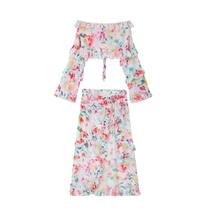 Floral print two-piece beach set with off-shoulder ruffle crop top and long wrap skirt