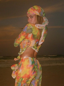 Three-piece chiffon beach set with colorful abstract print headscarf, top, and pants