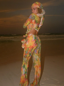 Three-piece colorful tie-dye beach set with chiffon wrap top and flared trousers