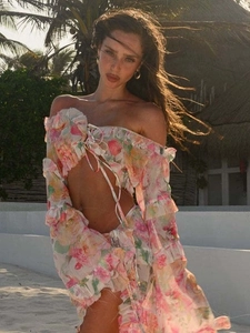 Two-piece floral beach set with off-shoulder long sleeve top and side slit maxi skirt