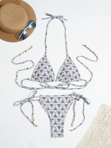 Bohemian plaid printed bikini set with halter top and side-tie bottoms on white background