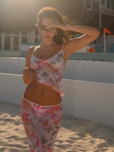 Floral mesh two-piece set with lace trim and pink bows for beach vacation wear