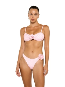 Pink polka dot bikini set with 3D floral accents and high-cut bottoms for women