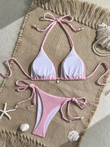 Pink waffle texture bikini set with tie-side bottom and beach holiday accessories