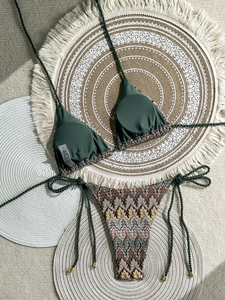 Bohemian forest green halter bikini set with zigzag pattern briefs on woven straw mats