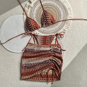 Detailed knit texture of bohemian chevron bikini set and drawstring beach skirt