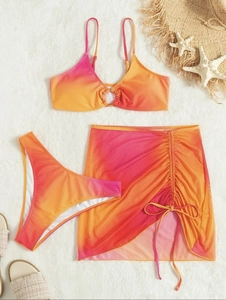 Detailed view of pink-orange ombre bikini set with drawstring sarong and ring detail
