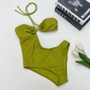 Olive green crinkled one-piece swimsuit with cutout waist and gold ring hardware
