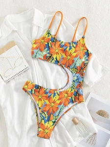 Women's floral one-piece swimsuit with waist cut-outs and orange straps for summer beachwear
