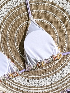 Detail view of purple bikini top with bohemian rainbow crochet trim and removable pads