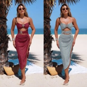 Close-up of beach set featuring starfish metal hardware and mesh wrap skirt details