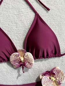 Three-piece solid burgundy triangle bikini top with ruffled edges and halter neck ties