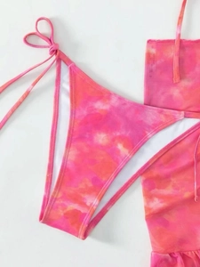 Three-piece pink and orange tie-dye bikini set with halter top and matching sarong skirt