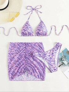 Three-piece purple marble print bikini set with matching mesh drawstring beach skirt