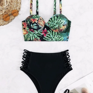 Two-piece tropical print bikini with underwire top and black high-waisted lace-up bottoms