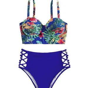 Two-piece bikini set with tropical floral print top and high-waisted lace-up blue bottoms