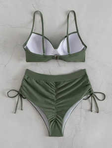 Detail view of olive green bikini set featuring adjustable straps and ruched high-waisted bottoms